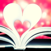 Heart coming out of an open book