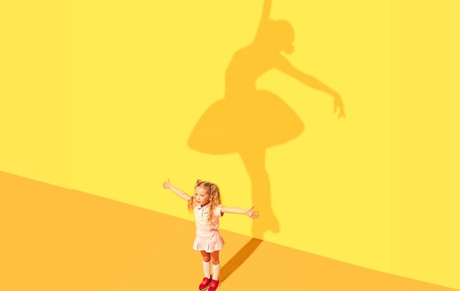 Honouring Our Dreams - Little girl with her shadow as a ballet dancer