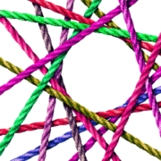 Connection - image of coloured ropes woven and connected in a circle