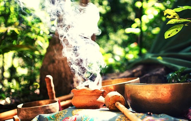 Photo of a ceremonial pot with smoke