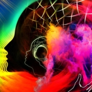 Collage concept photo of a silhouetted face and swirling colours